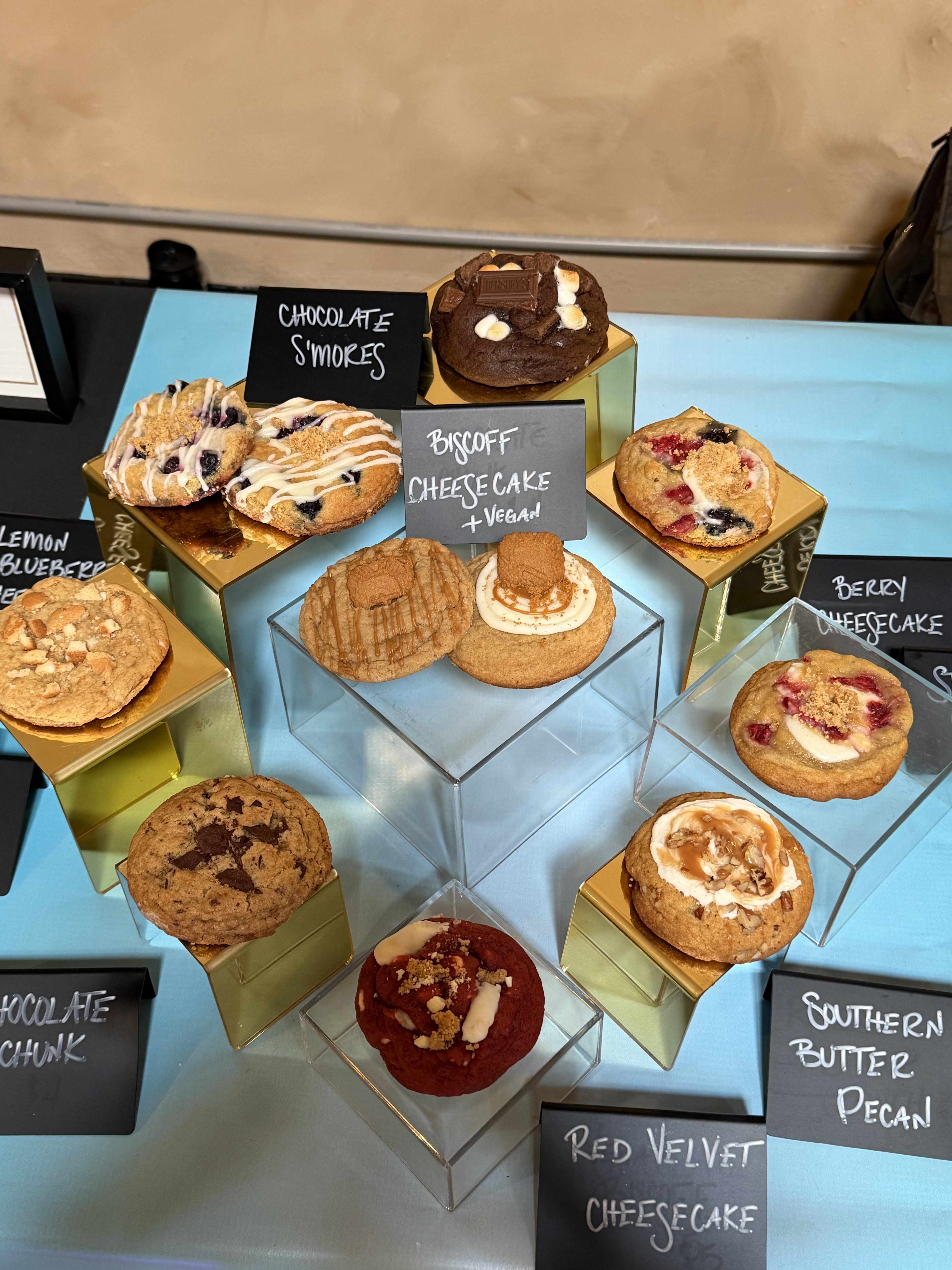 A catered spread of assorted gourmet cookies arranged for an event